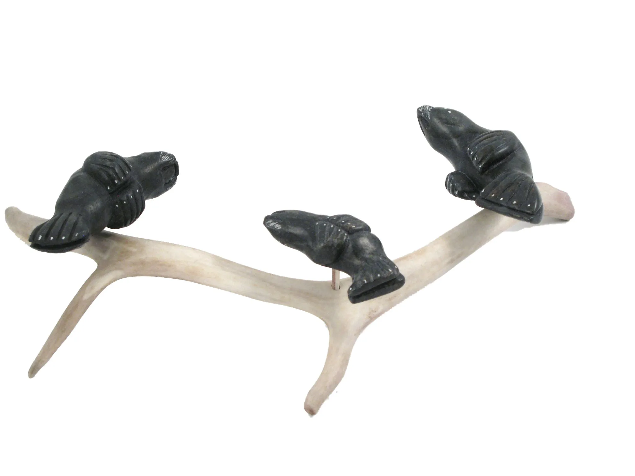 Basking seals Inuit soapstone carving by Artist Pita Pirti