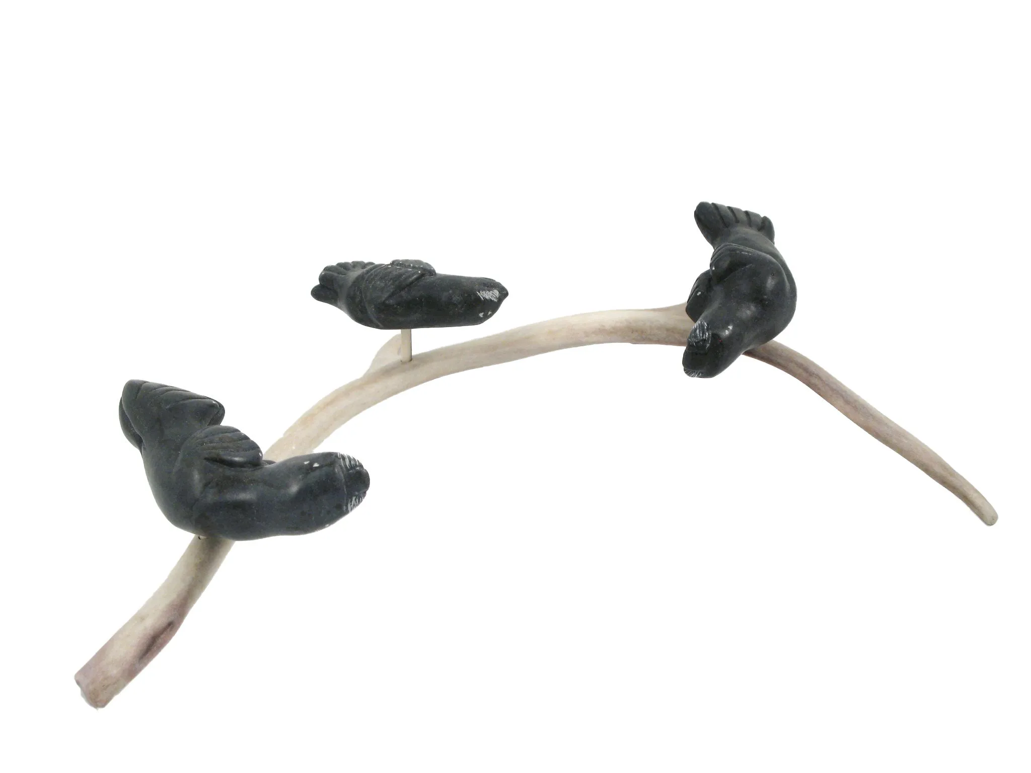 Basking seals Inuit soapstone carving by Artist Pita Pirti
