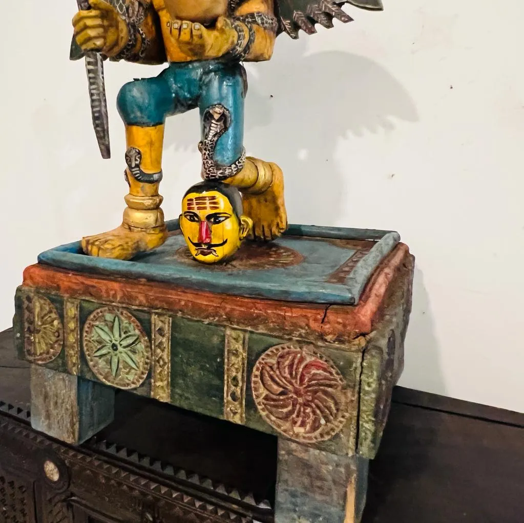 Garuda  : Handpainted Wooden Sculpture with unusual Colouring seated on a chowki (33 inches )