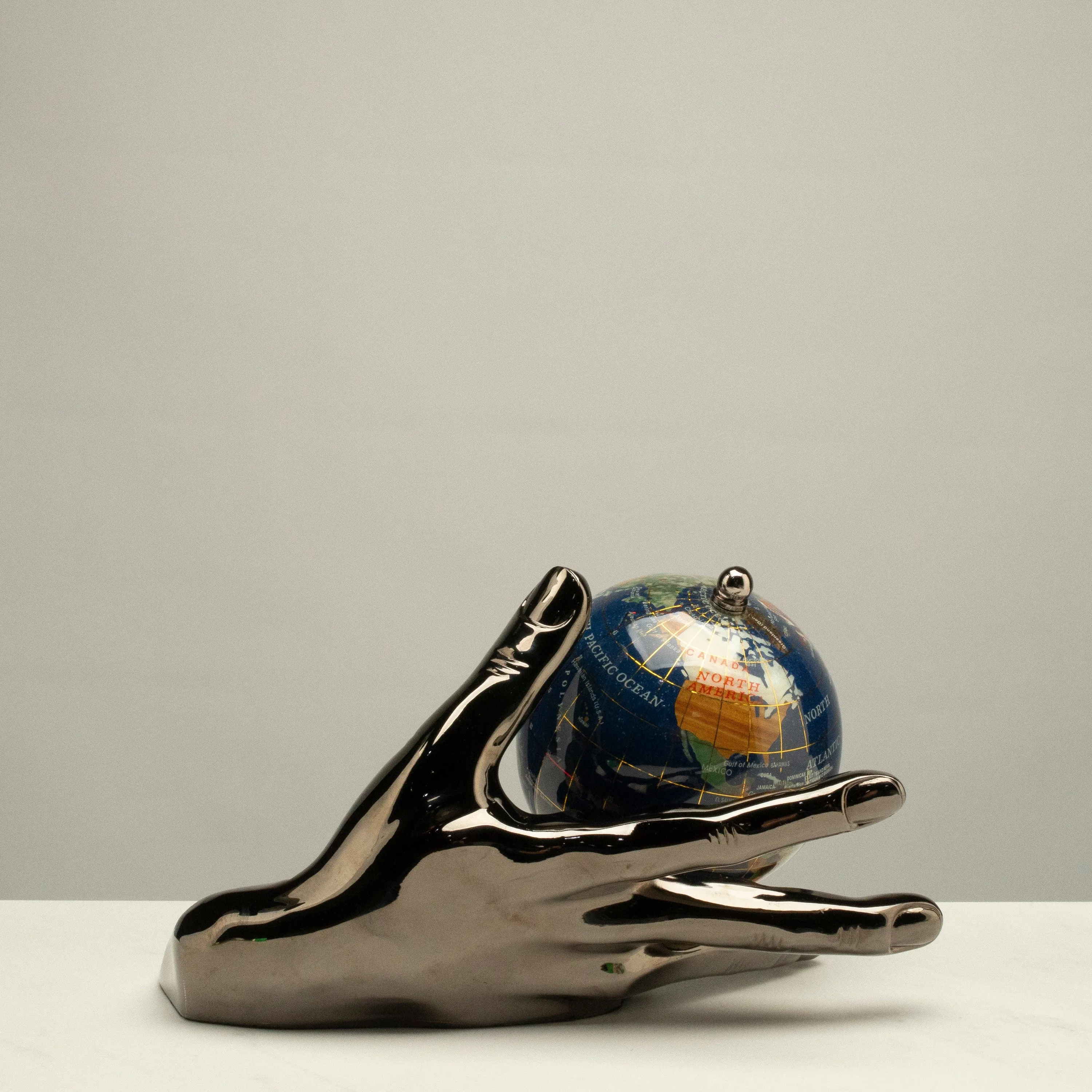 World In Your Hand - Gemstone Globe with Lapis Ocean Embraced with Gun Metal Base
